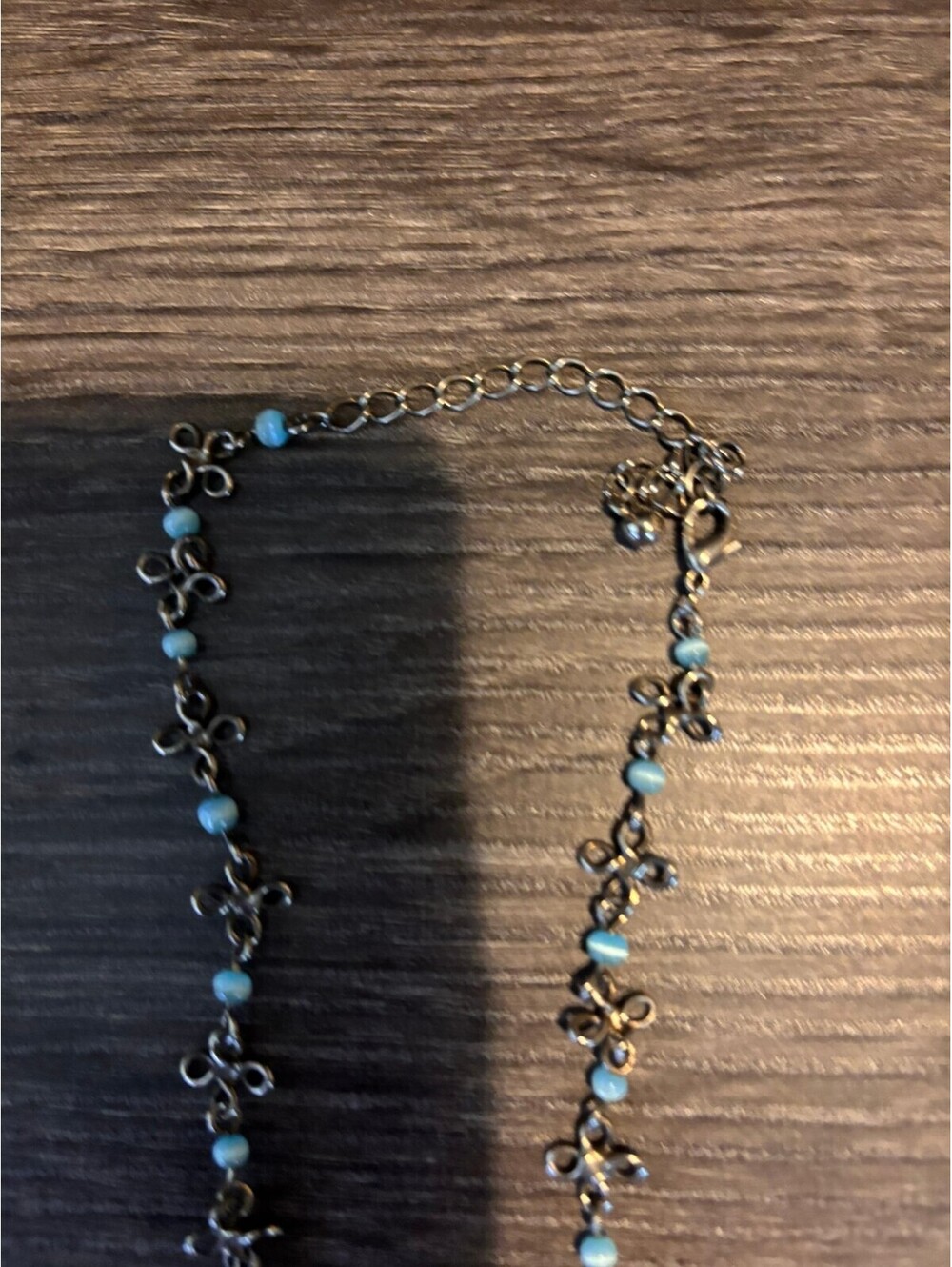 Delicate Silver-Tone Necklace with Blue Beads and Floral Links